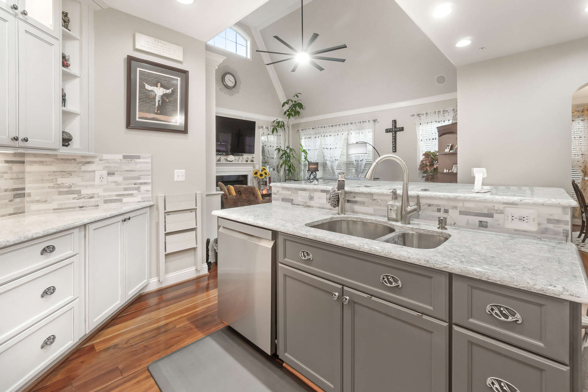 grey island with white cabinetry kitchen